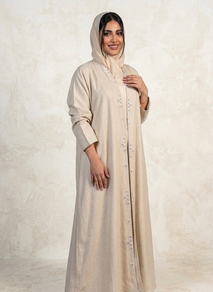 عبايه من اللنن الطبيعي بلون البيج الهادئ